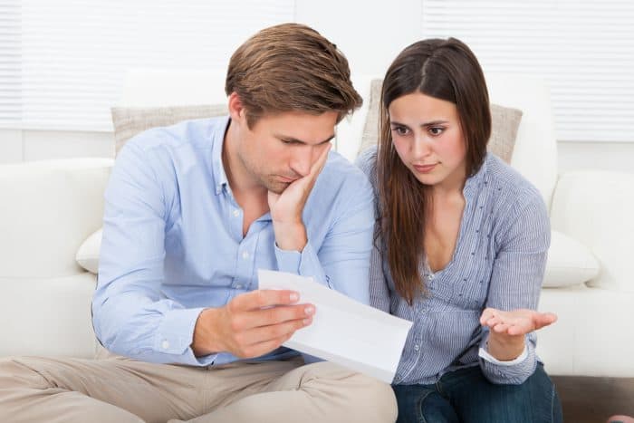 Couple looking over life insurance plan