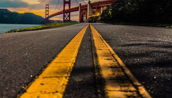 California minimum insurance: yellow lines on the road