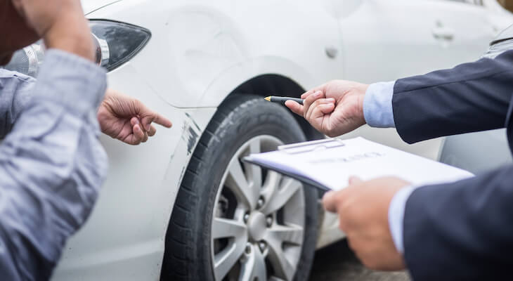 What is comprehensive coverage: people pointing out the scratches of a car