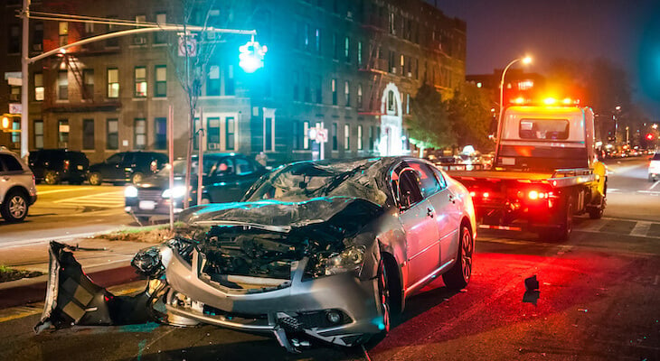 What do policy numbers mean?: damaged car on a street