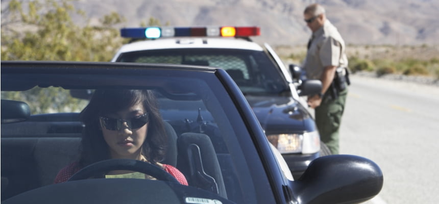 Woman getting a speeding ticket