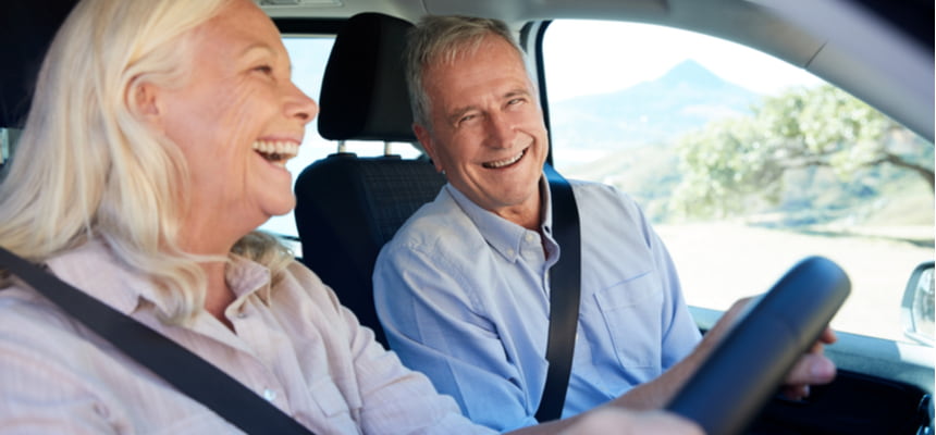 Retired couple driving with the best cheap car insurance in Colorado (1)