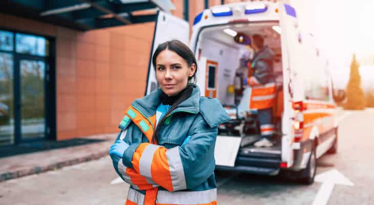 how much is an ambulance ride: paramedics and a parked ambulance