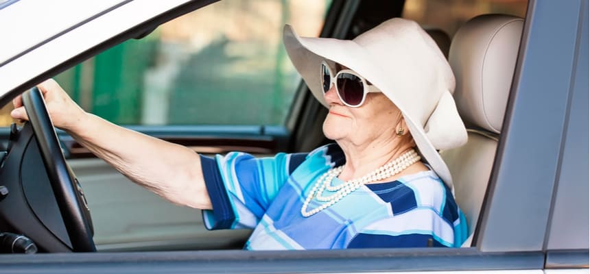 Retired woman driving in Alabama with cheap car insurance (1)