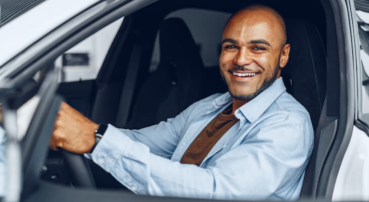 Man happily driving