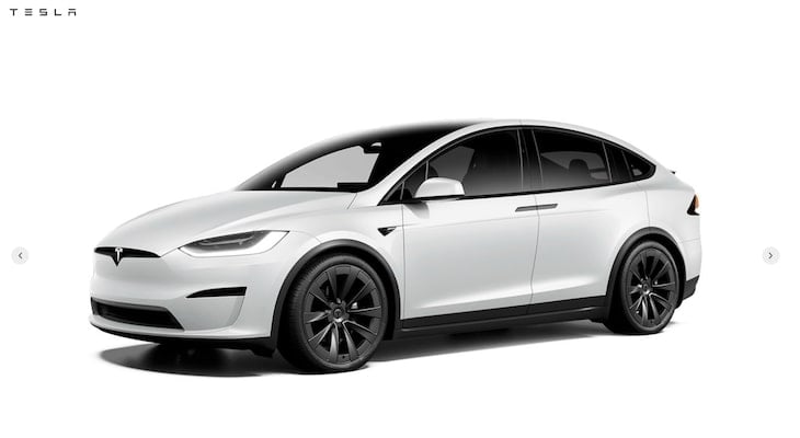 Audi e tron vs Tesla: white Tesla front-side view
