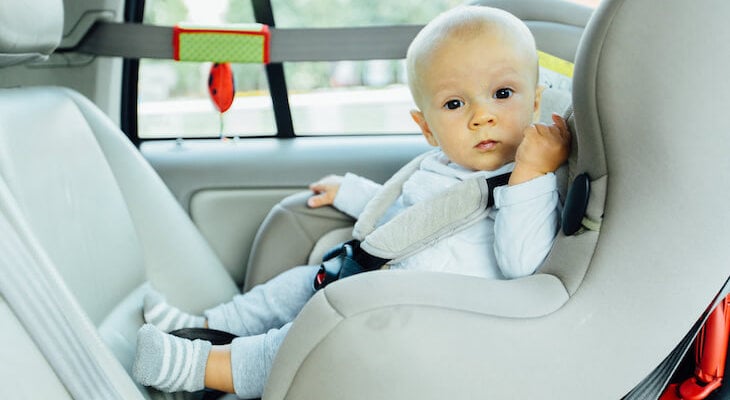 Safest cars for babies: baby in a child safety seat inside a car