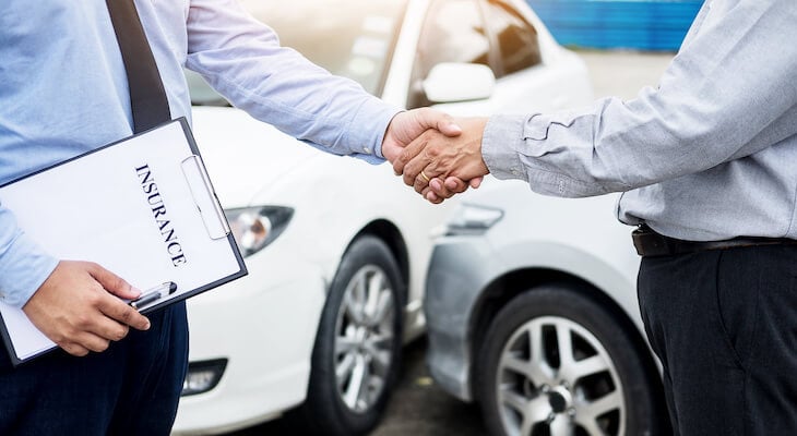 Client shaking hands with an insurance agent