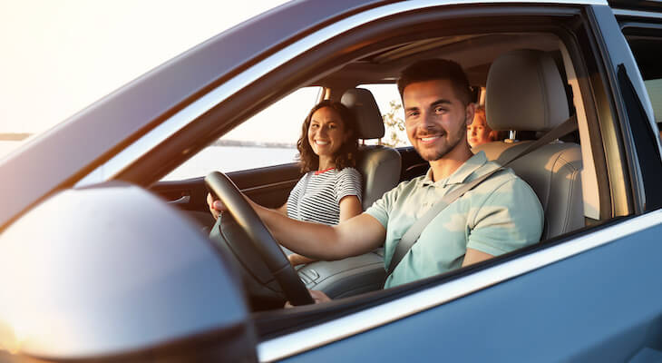 How to shop for car insurance: family riding a car