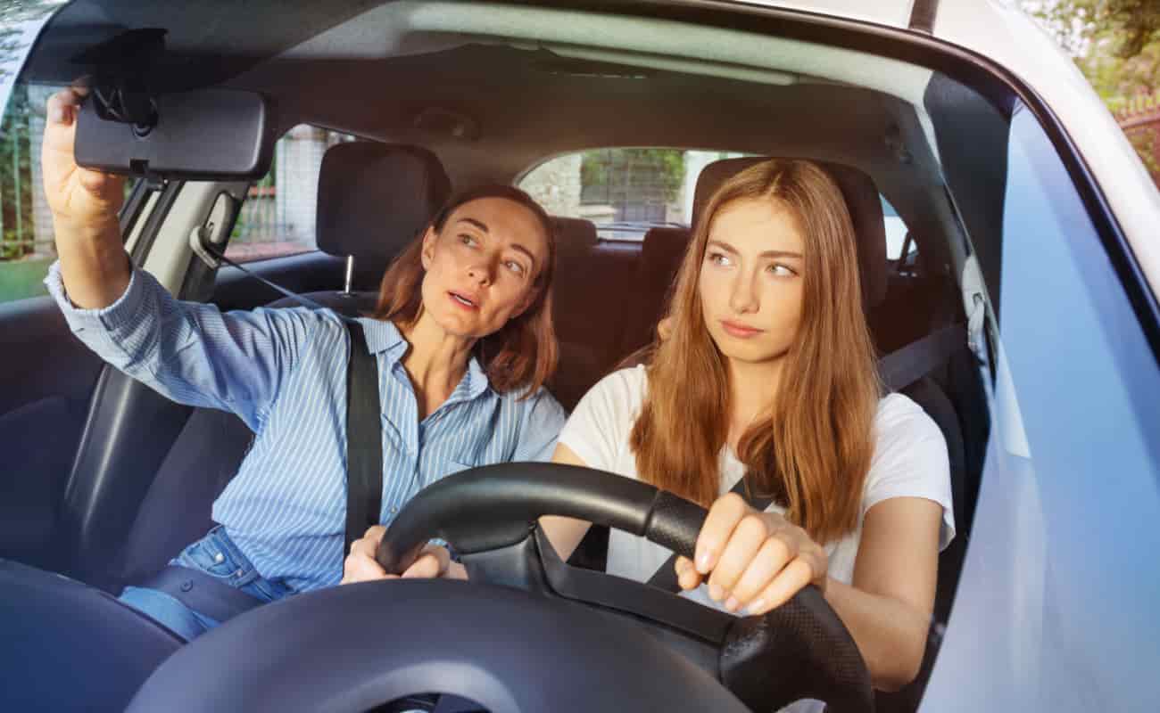 teen driver in the car with her mom
