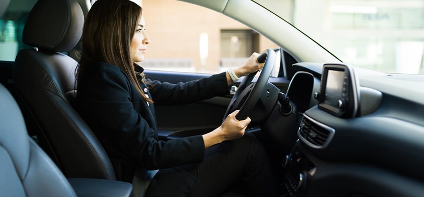 Woman driving a new leased vehicle